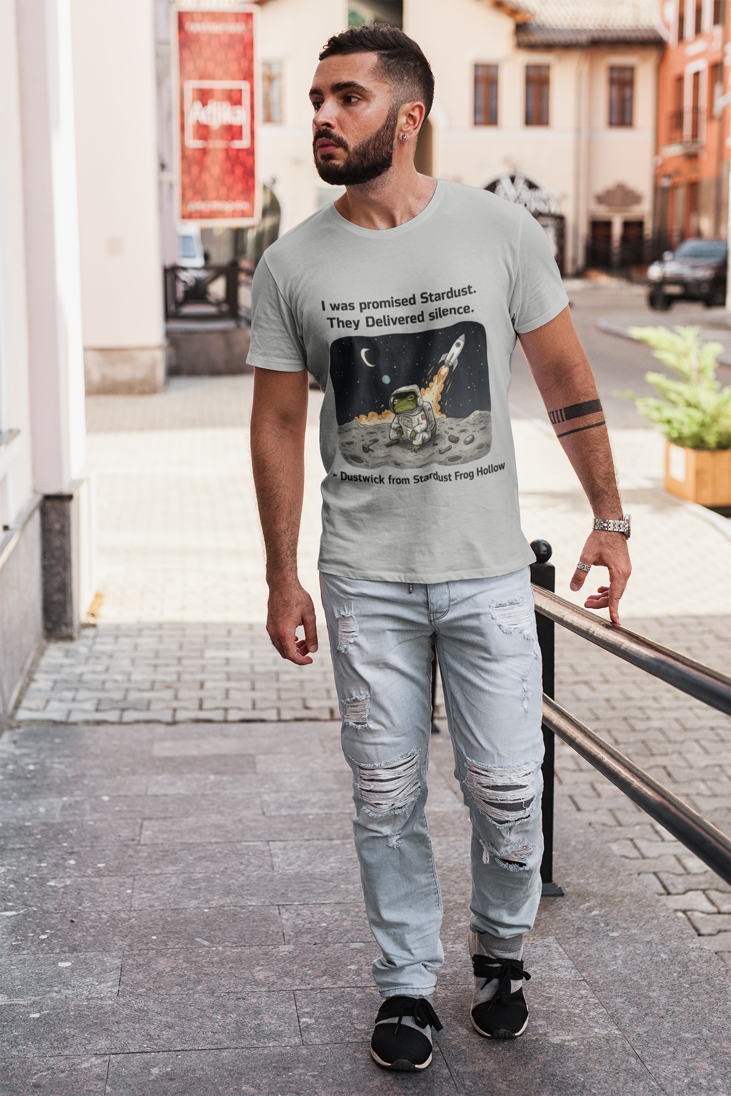 Dustwick Stardust Frog T-Shirt, “I Was Promised Stardust” Cosmic Frog Tee, Dark Whimsical Graphic Shirt, Existential Frog Art, Indie Aesthetic, Unisex Jersey Short Sleeve Tee
