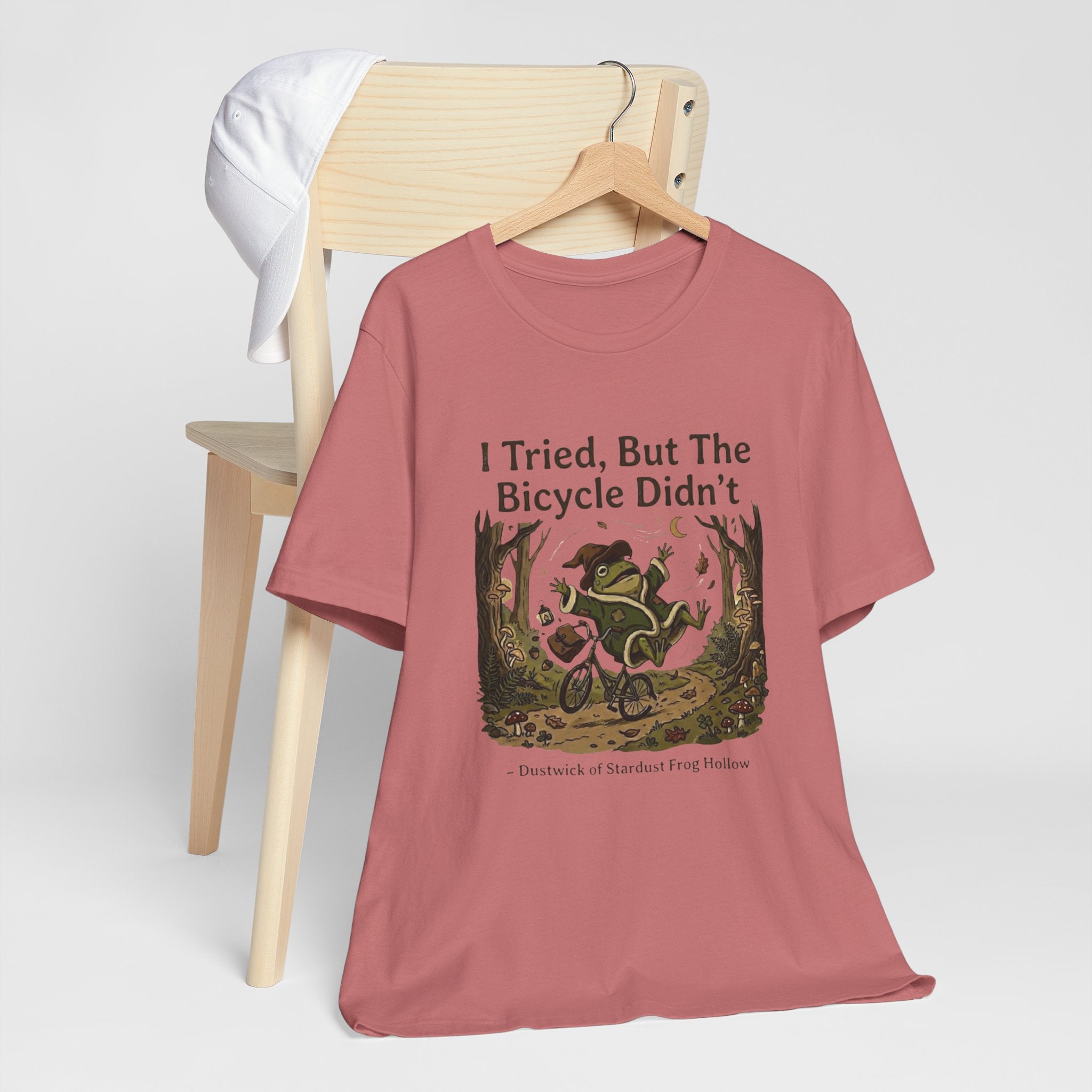 Dustwick Broken Bicycle T-Shirt, "I Tried" Whimsical Frog Riding Damaged Bike Shirt, Surreal Fantasy Frog Art, Dark Cozy Aesthetic Graphic Tee